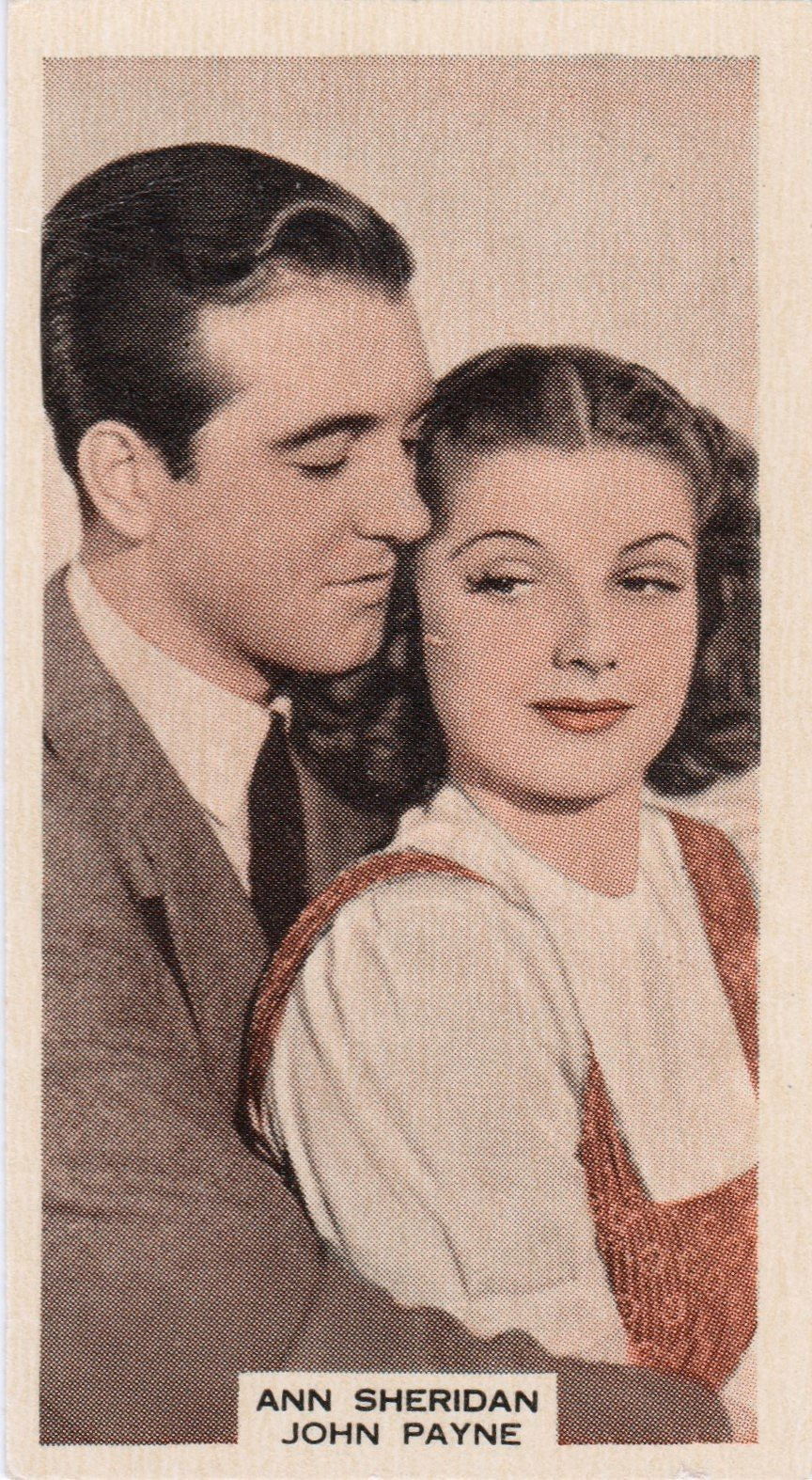 ANN SHERIDAN AND JOHN PAYNE in "DEVIL ON WHEELS"