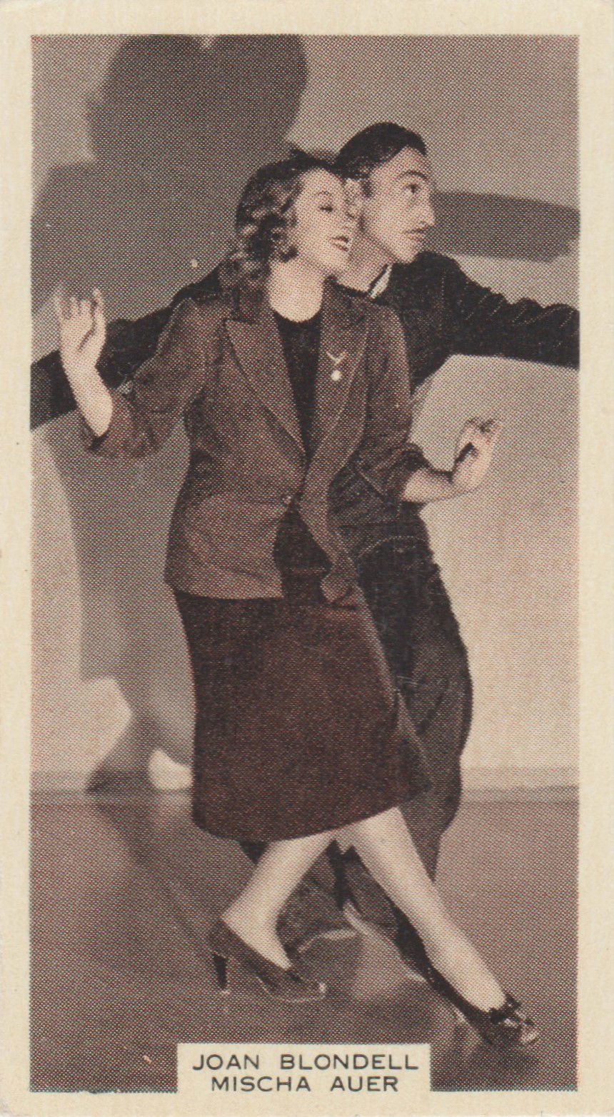 JOAN BLONDELL AND MISCHA AUER in "EAST SIDE OF HEAVEN"