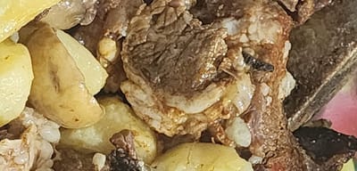 אסאדו עם תפוחי אדמה ופטריות בבירה