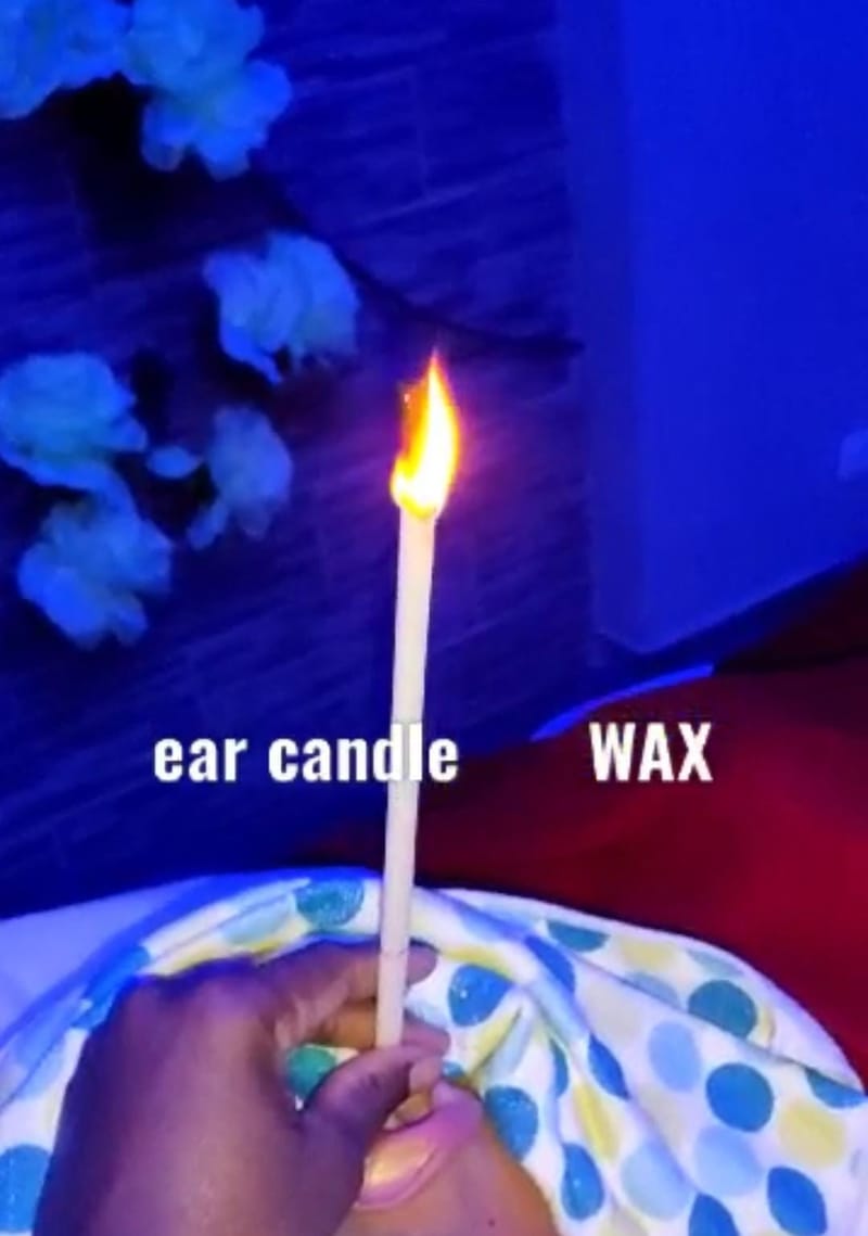 Ear candle wax massage