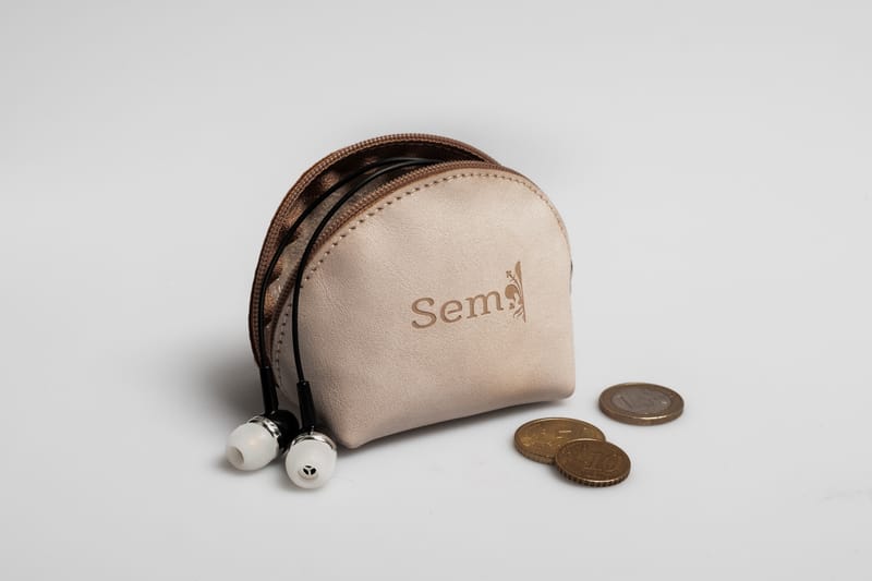 Art. 208 - Portamonete