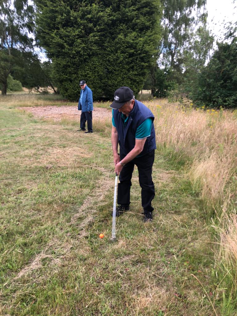 Golf in Society - John (Sandy) in action