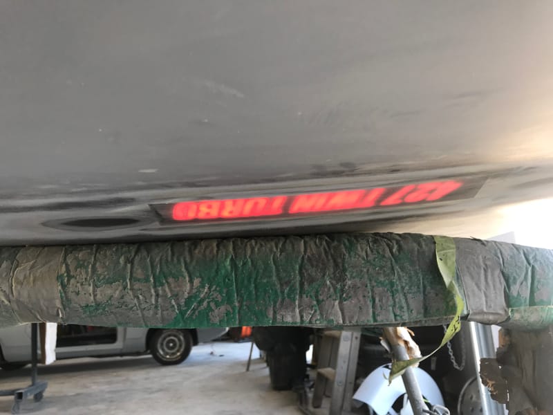 C6 toggle switch activated light up hood emblem