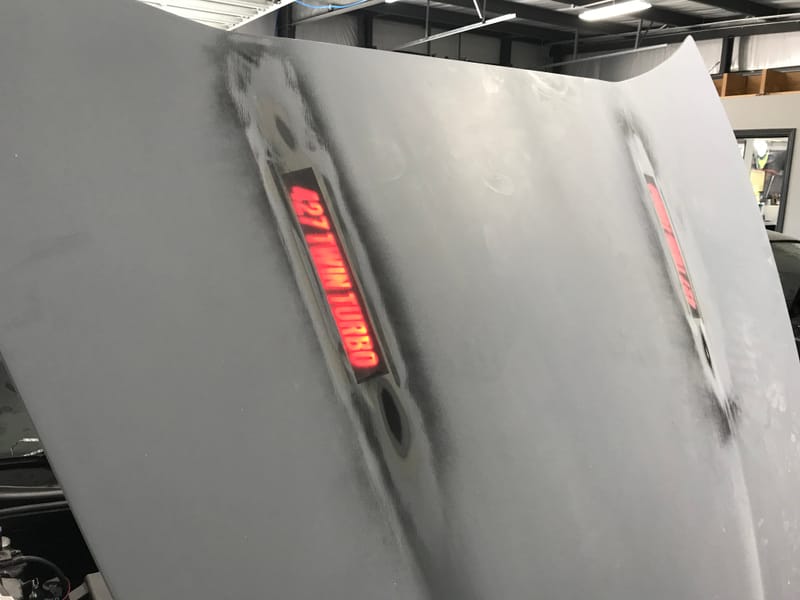 C6 toggle switch activated light up hood emblem