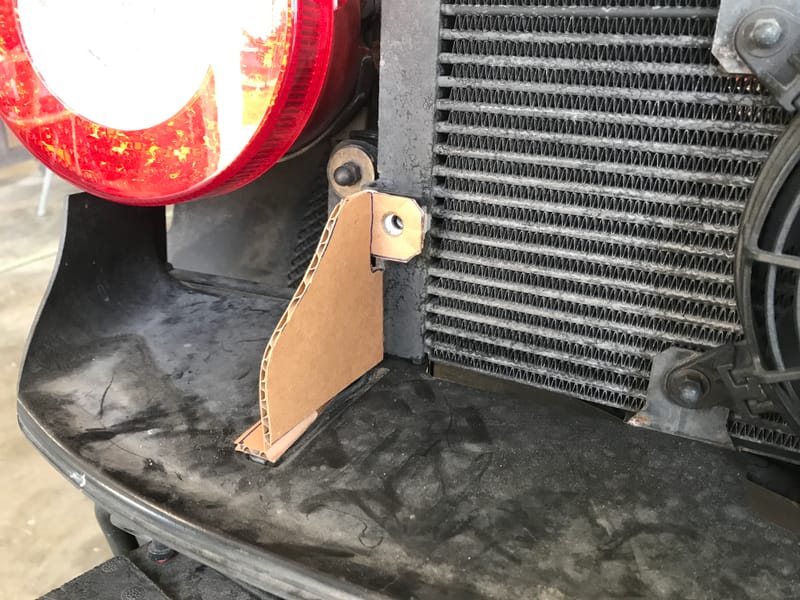 Custom brackets for an air duct for a Ferrari 458