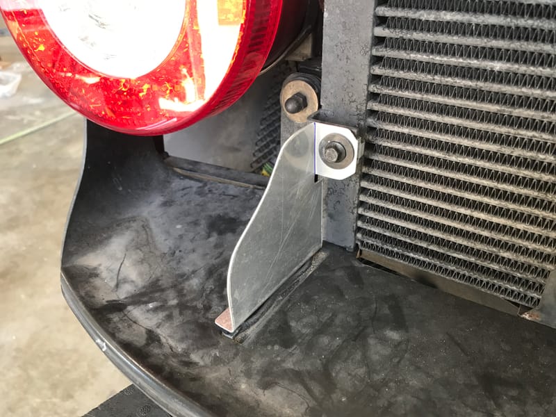 Custom brackets for an air duct for a Ferrari 458