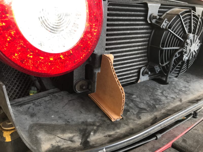 Custom brackets for an air duct for a Ferrari 458