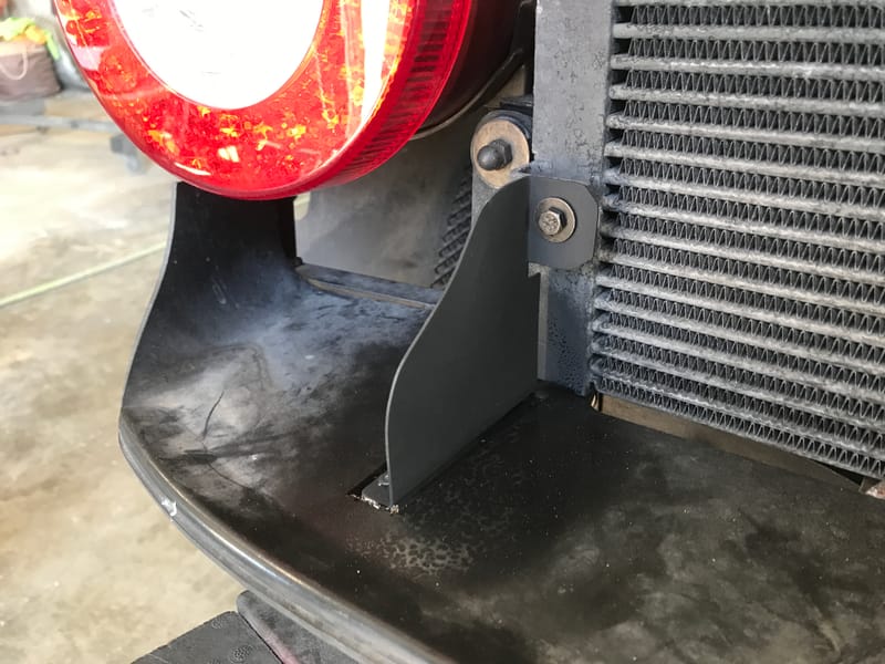 Custom brackets for an air duct for a Ferrari 458