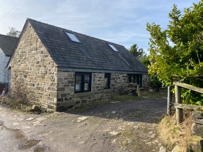 PERMISSION GRANTED TO convert and extend outbuilding to a dwellinghouse  at bunkers, saddleworth image