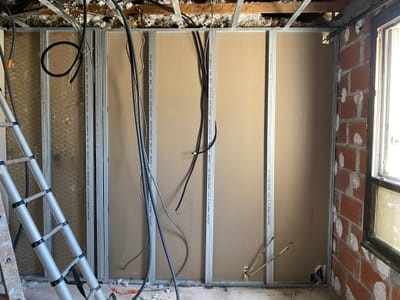 Plâtreries et pose de plaque de plâtre.