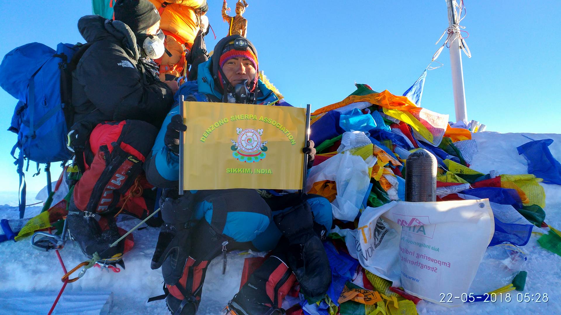 Denzong Sherpa Association Flag hoisted in the top of the World