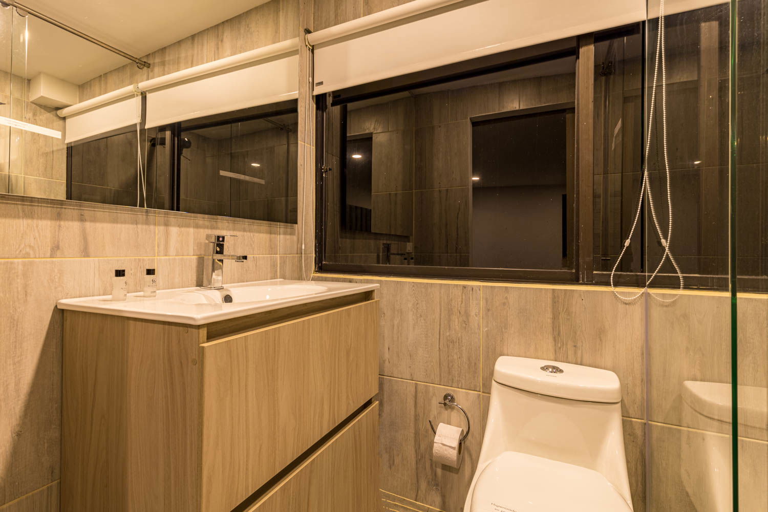 "Elevate Your Self-Care Routine: Indulge in Spa-like Luxury in the Lavish Bathrooms of our Medellin Villa"