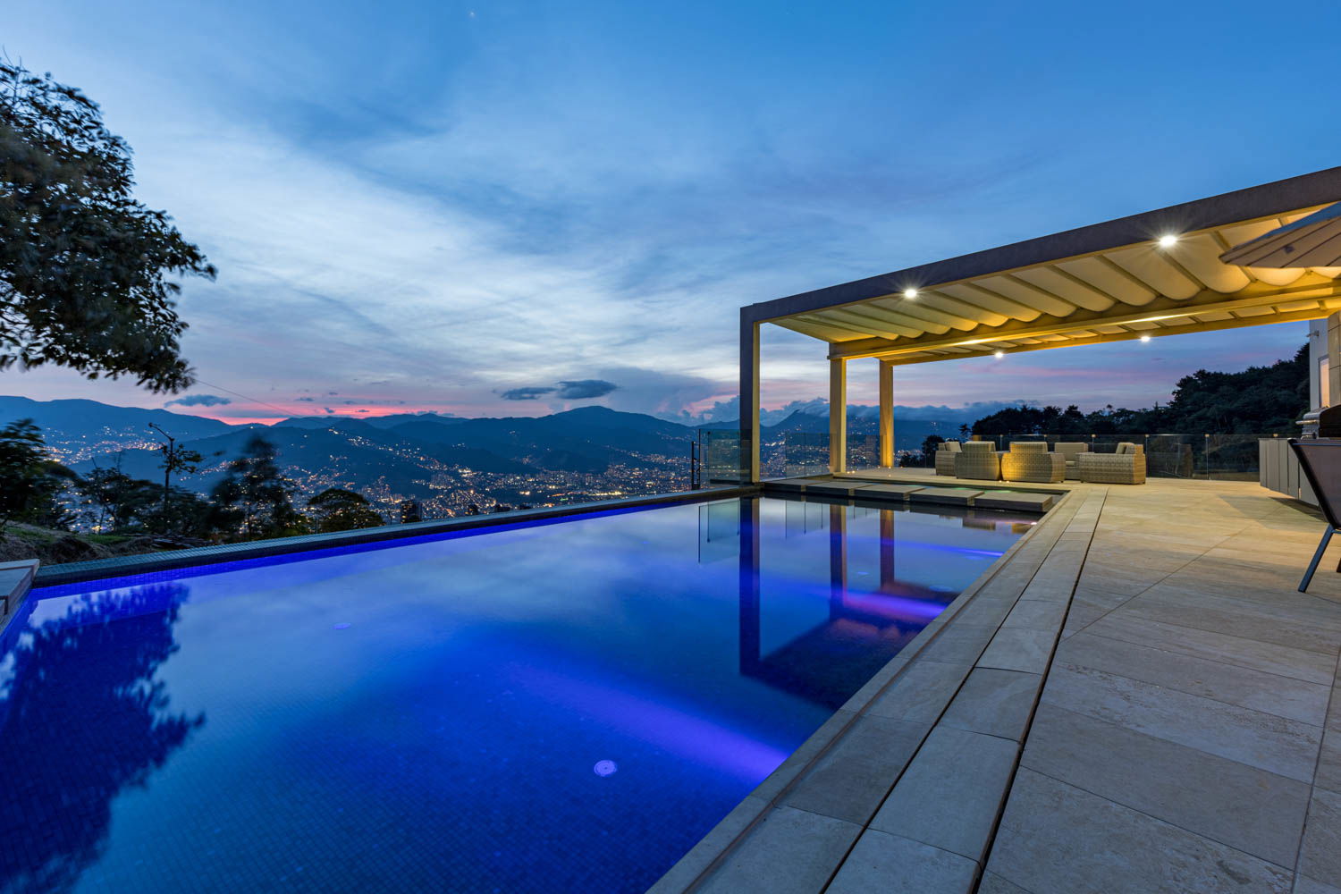 Poolside Paradise: Dive into Luxury and Savor Exquisite Barbecue Delights at our Medellin Villa"