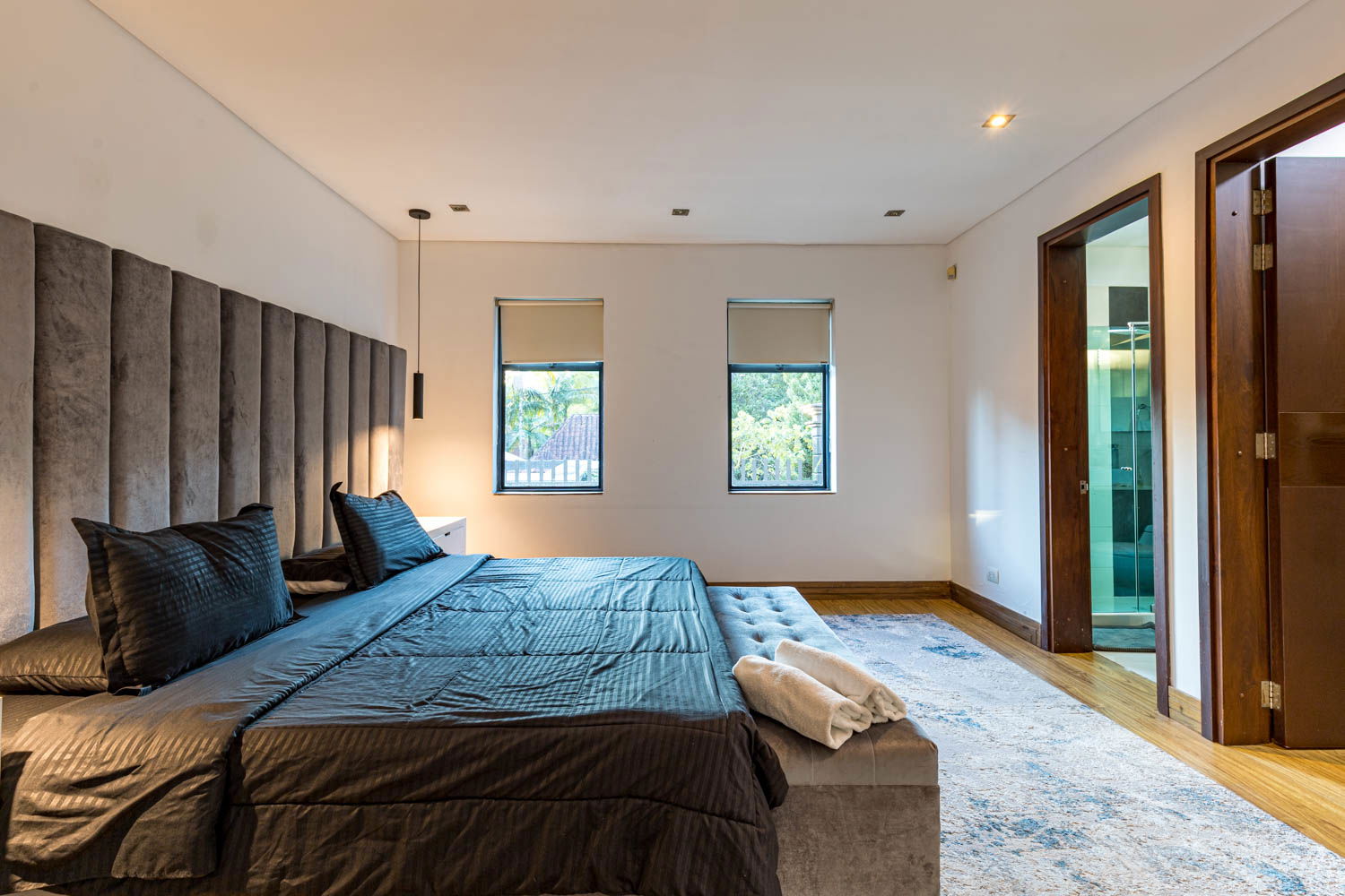"Retreat in Opulence: Find Tranquility and Luxury in the Bedrooms of our Medellin Villa"
