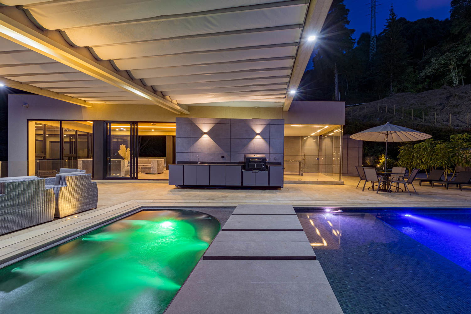 Poolside Paradise: Dive into Luxury and Savor Exquisite Barbecue Delights at our Medellin Villa"