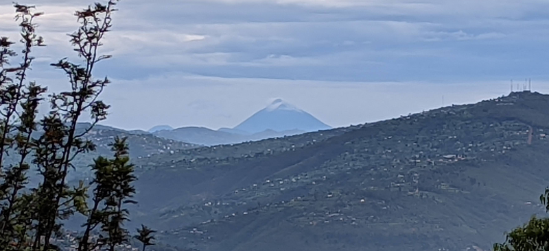 Marveling at the Volcanoes from the Terrace of Eagle View Lodge