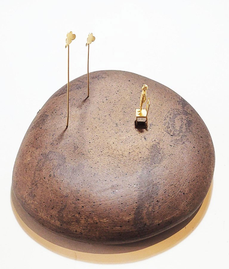ESCULTURA MUNDINHO SONHADOR