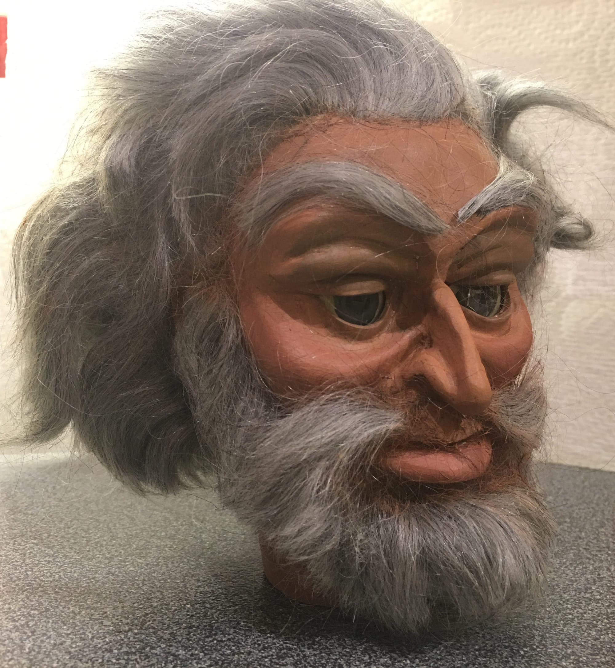 Grey haired caveman resculpted by Lee Allwood