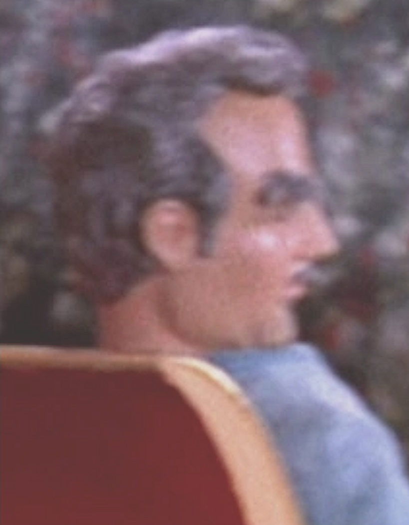 Man in light blue suit