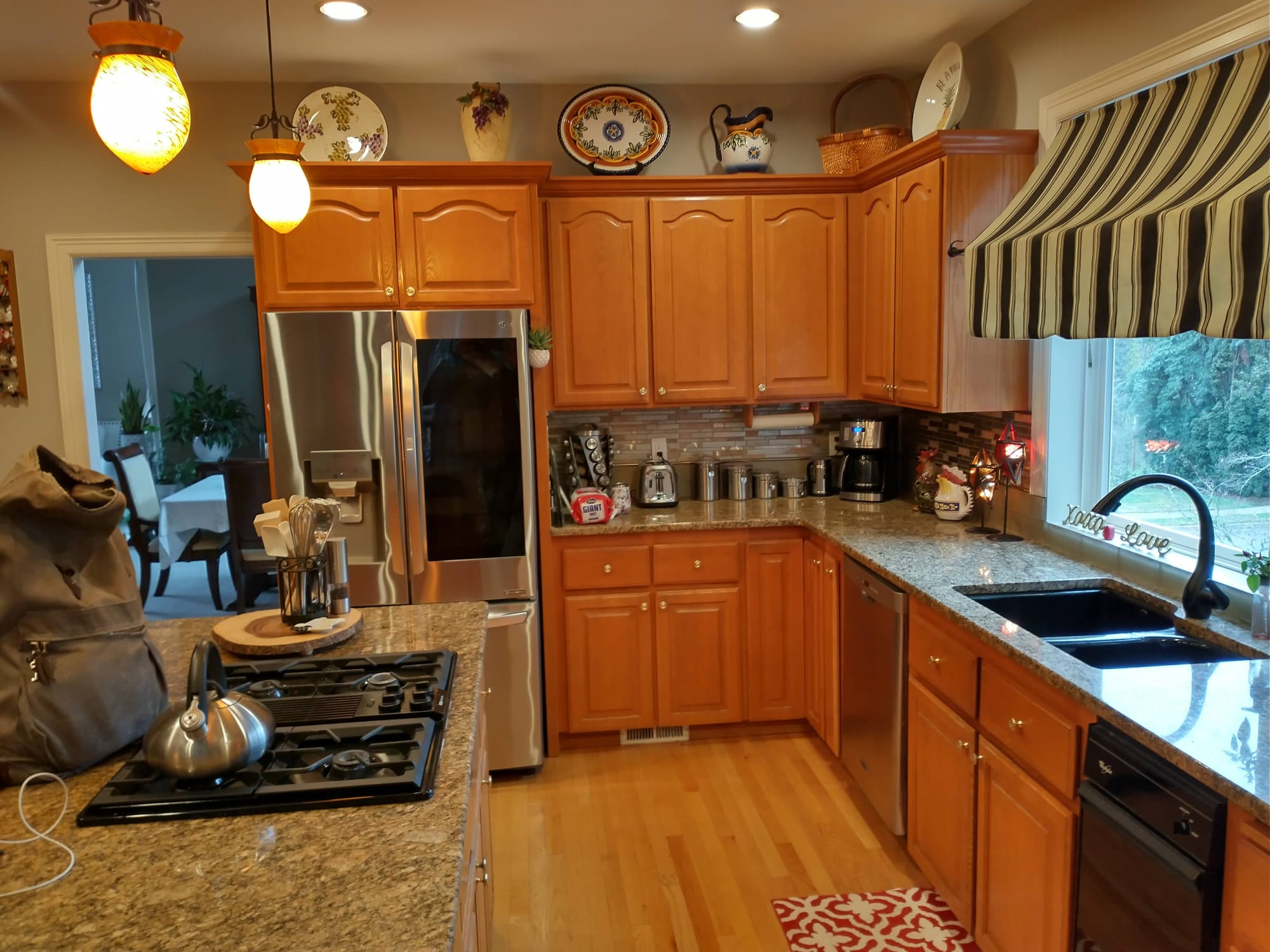 Before Cabinet Refinishing Near Fridge