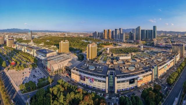 What is sold in each district of Yiwu China?