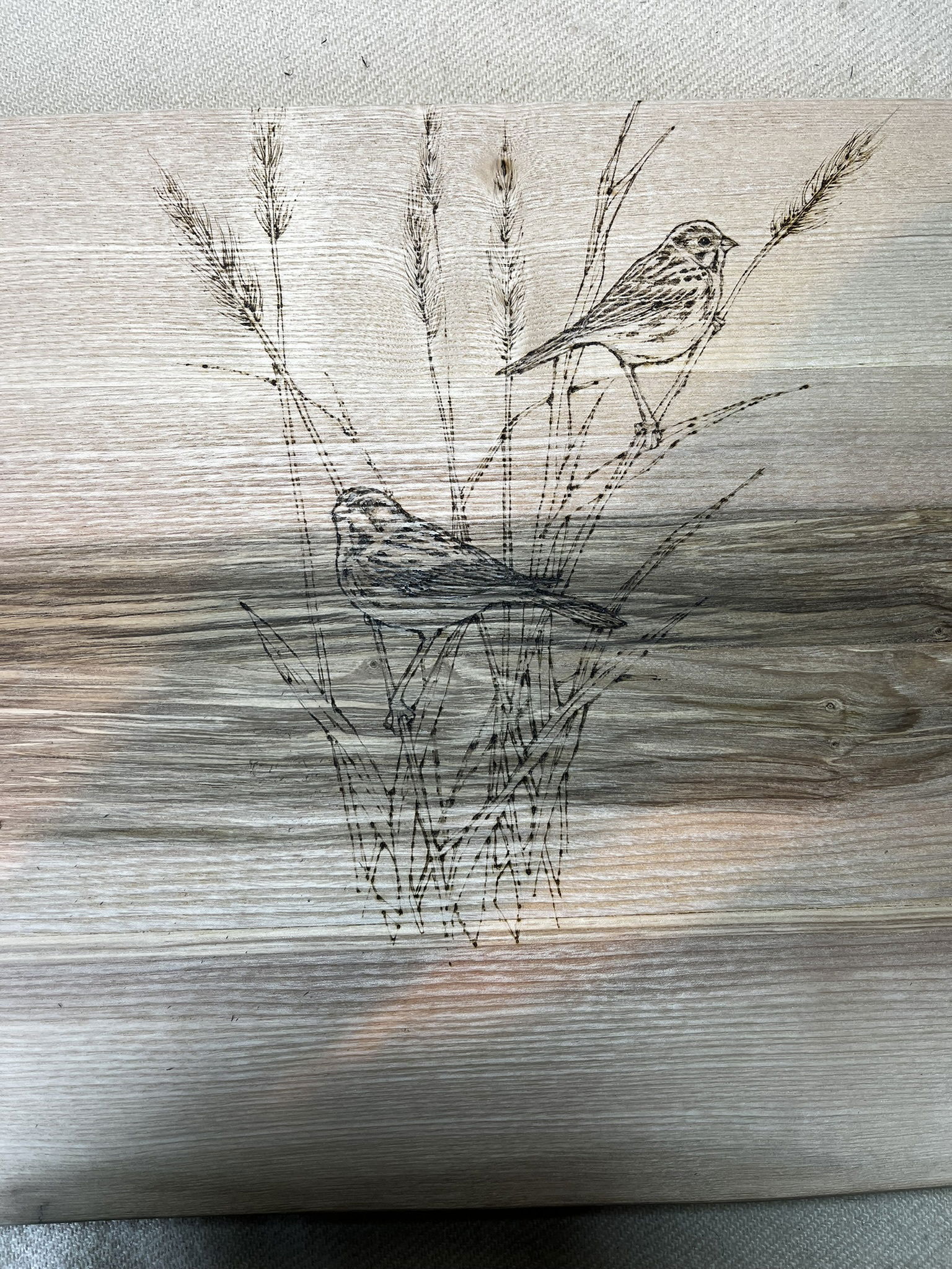 Pyrography on boxes, mirrors and furniture.