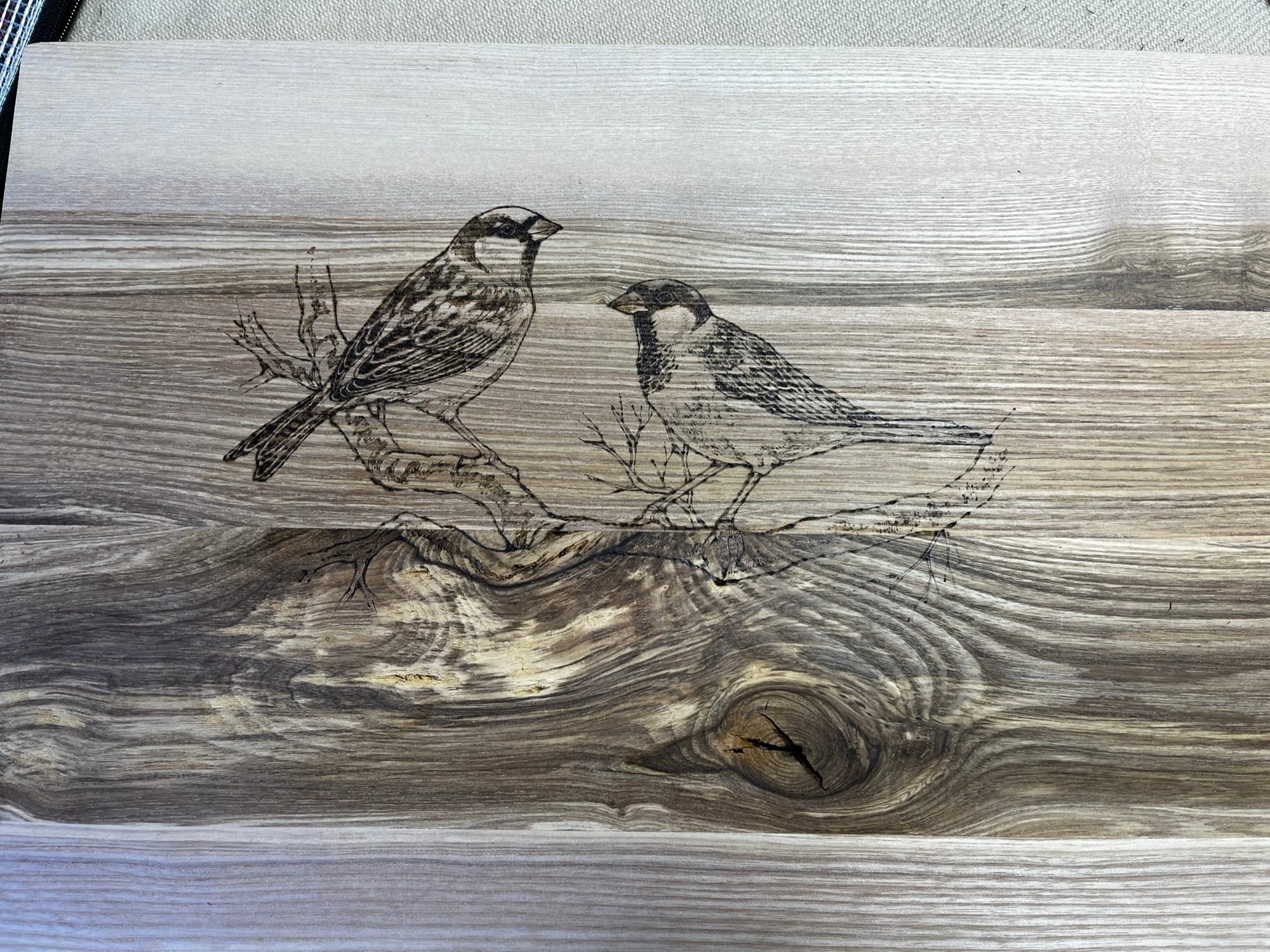 Pyrography on boxes, mirrors and furniture.