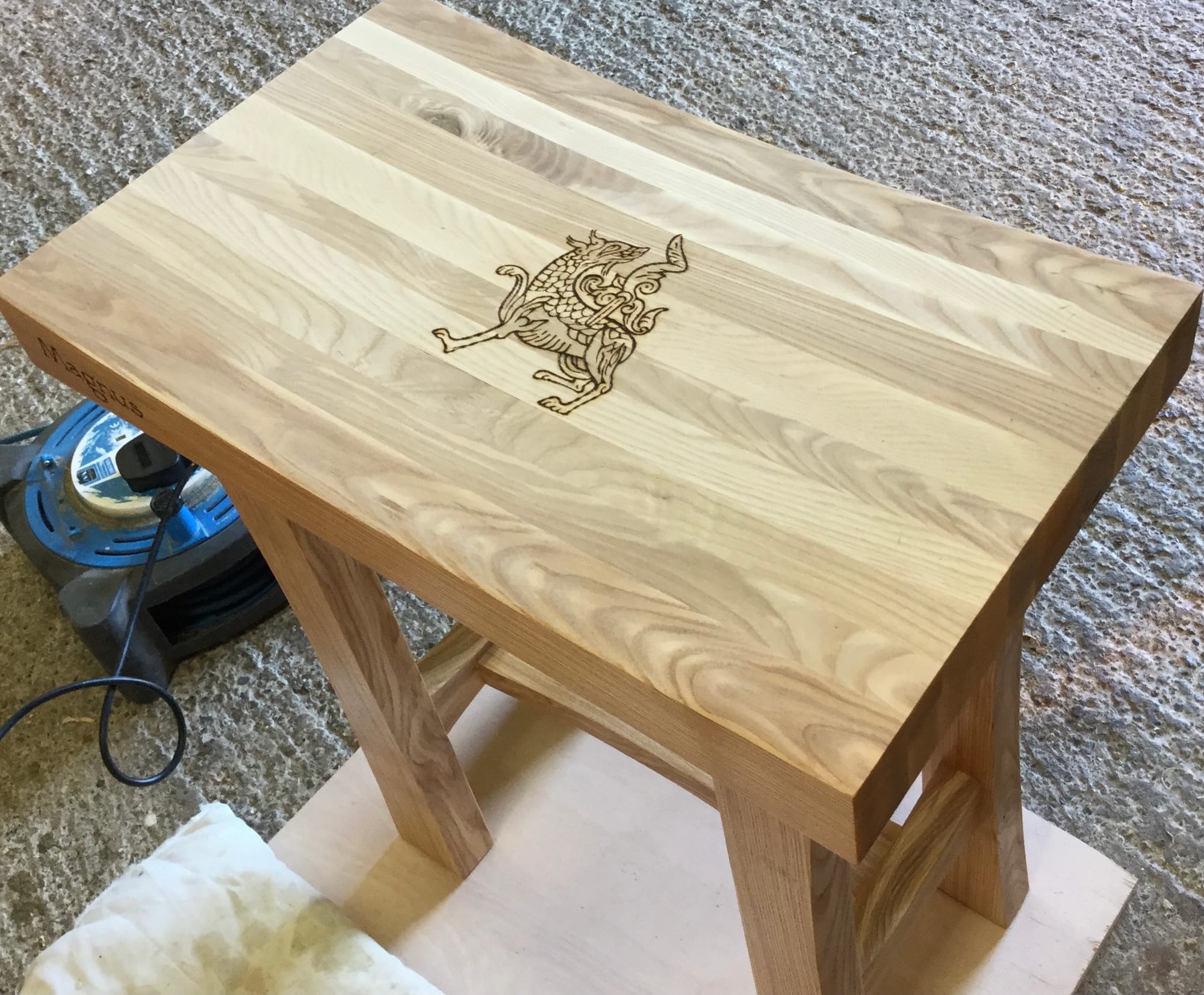 Pyrography on boxes, mirrors and furniture.