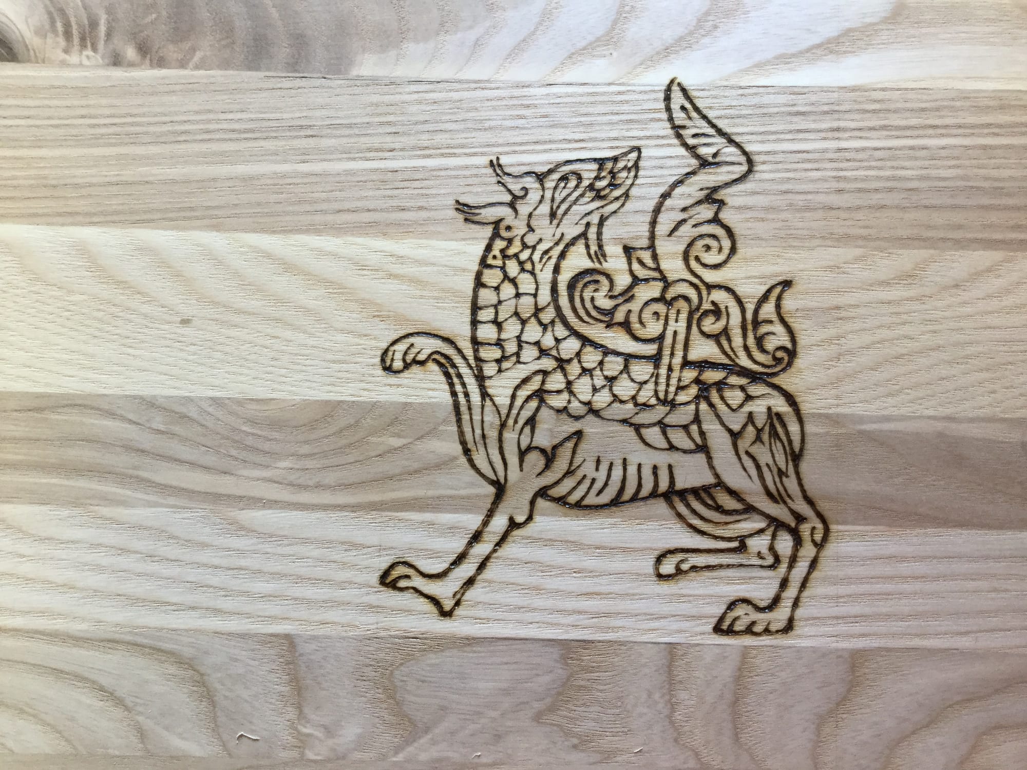 Pyrography on boxes, mirrors and furniture.