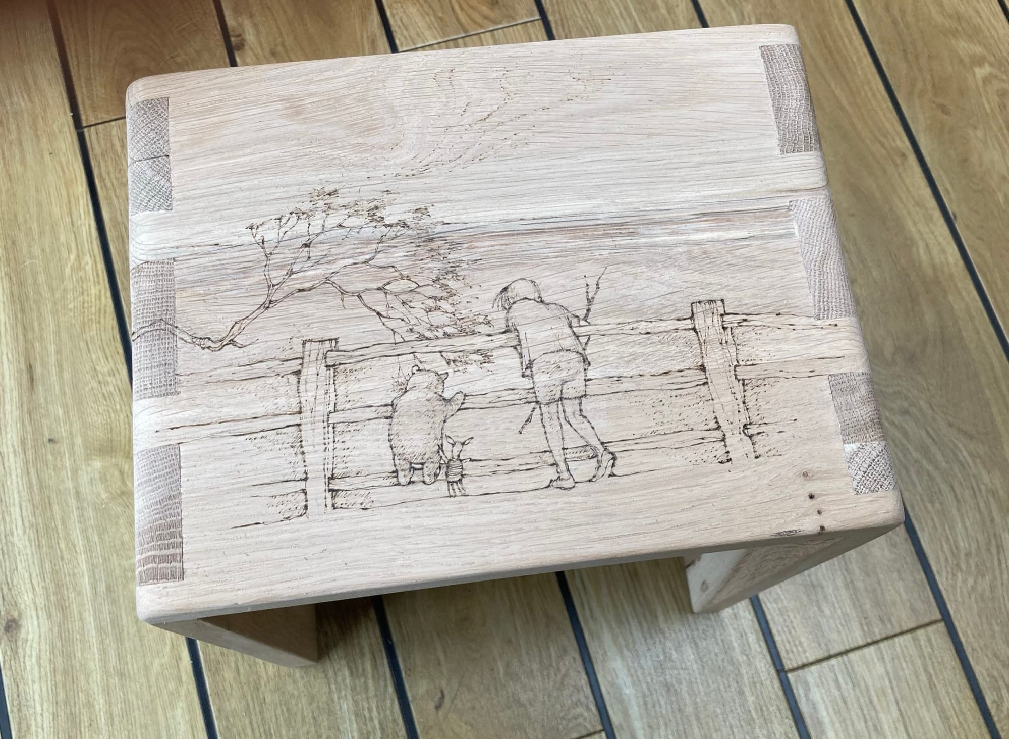 Pyrography on boxes, mirrors and furniture.