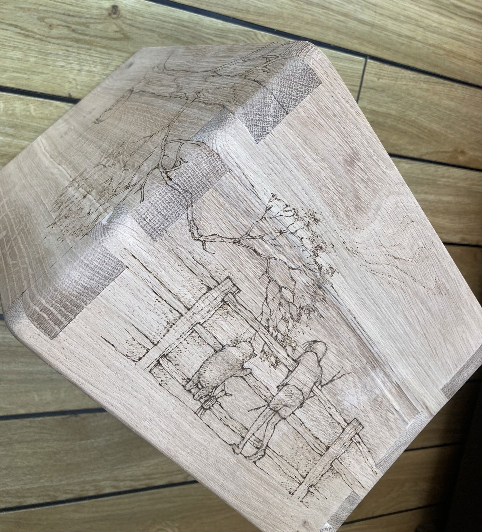 Pyrography on boxes, mirrors and furniture.