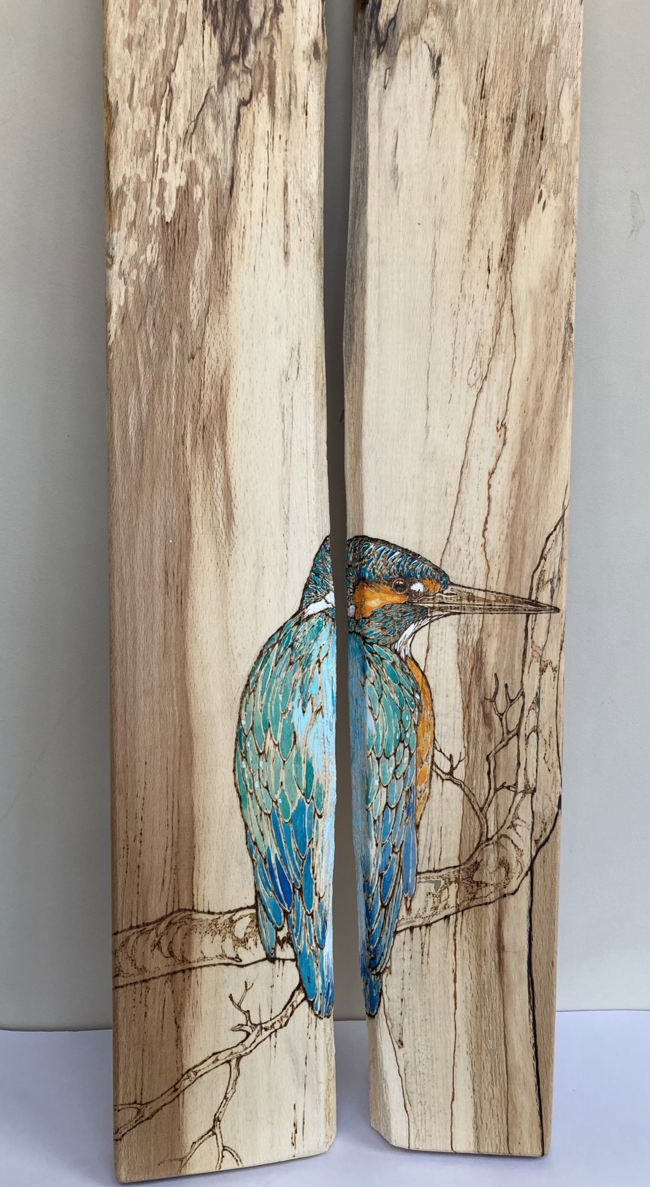 Pyrography on boxes, mirrors and furniture.