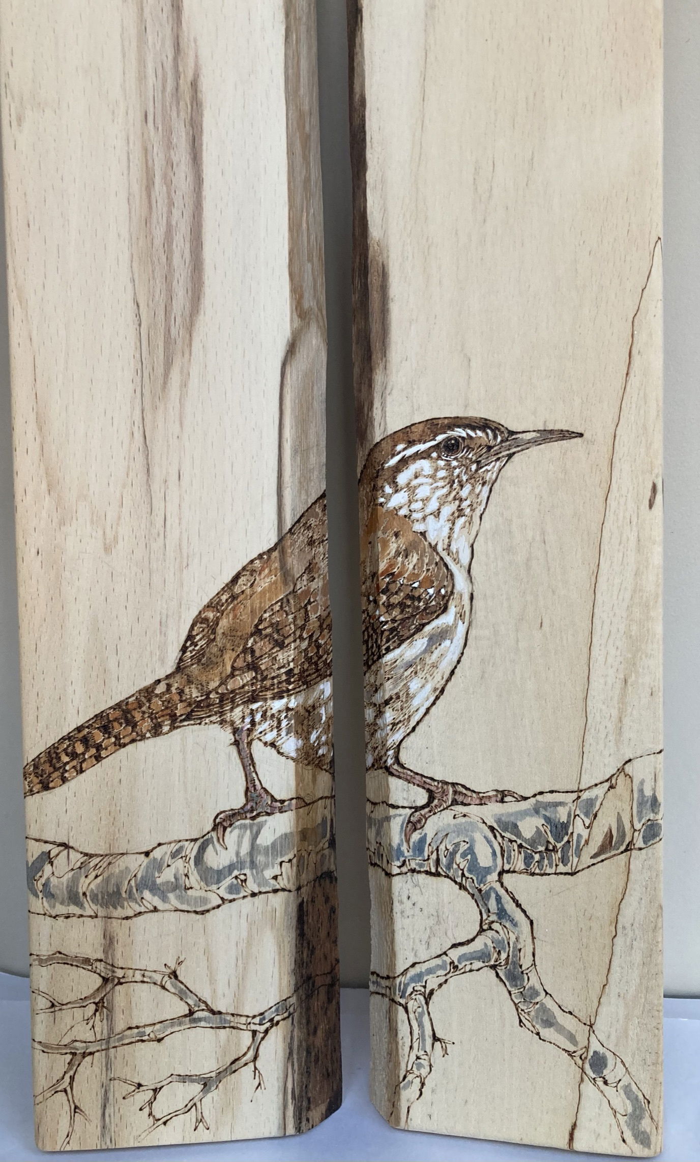 Pyrography on boxes, mirrors and furniture.