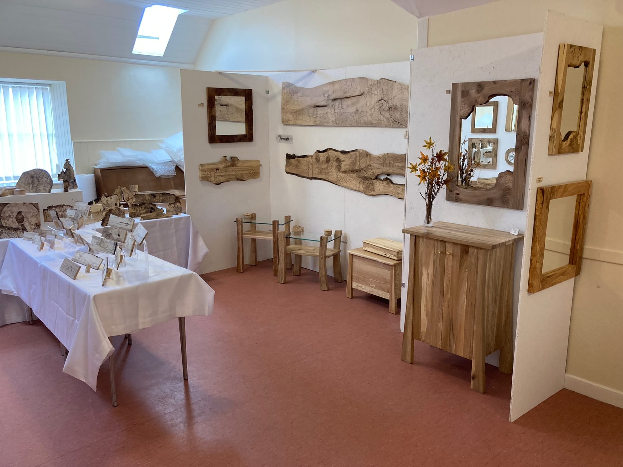 Pyrography on boxes, mirrors and furniture.