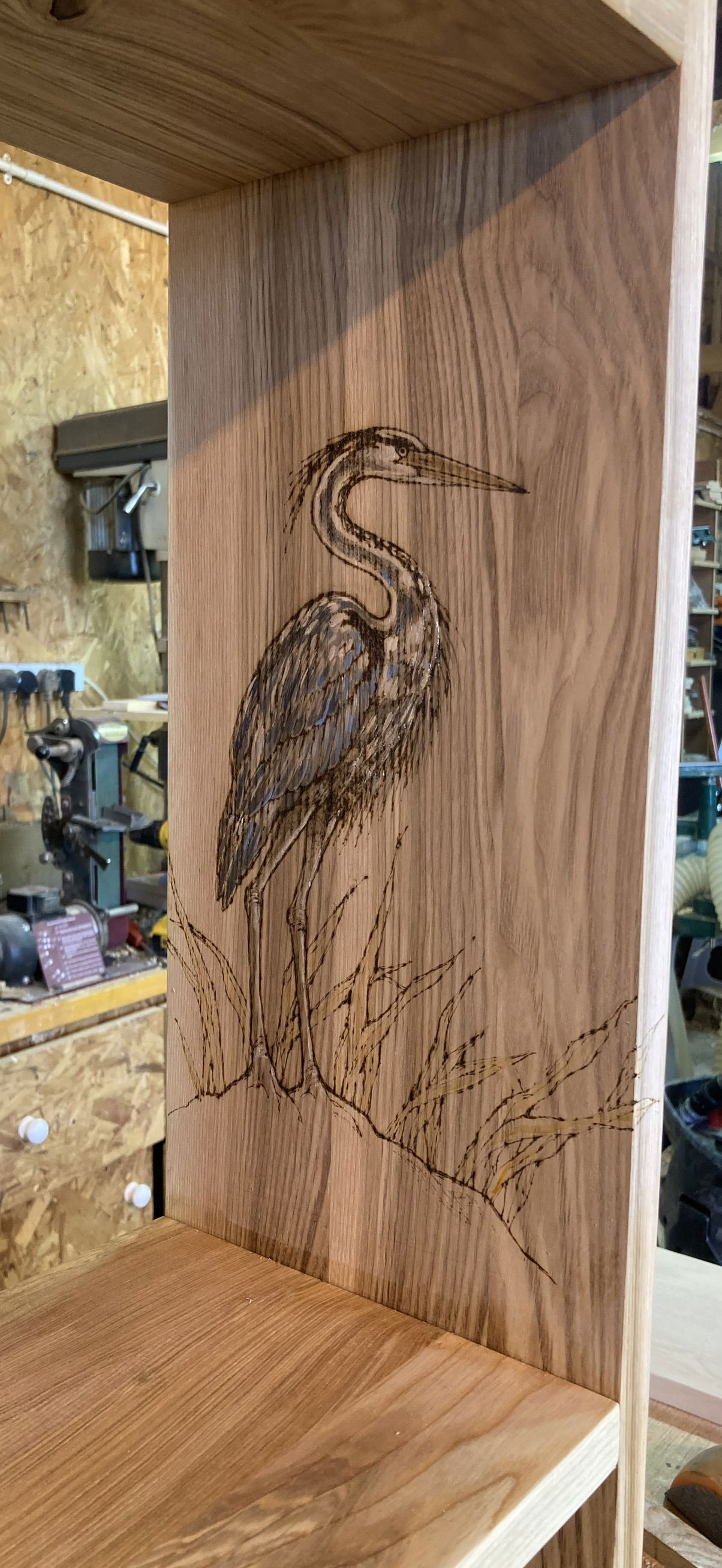 Pyrography on boxes, mirrors and furniture.