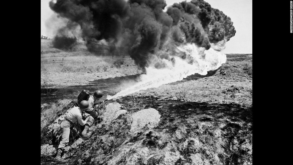 Korean War, Marines use a flamethrower in April 1951.