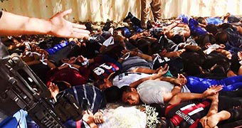 Isis War ISIS militants publish images appearing to show the massacre of Iraqi servicemen in Tikrit