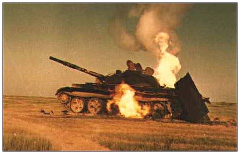 Iraq War An Iraqi T-55 tank burns