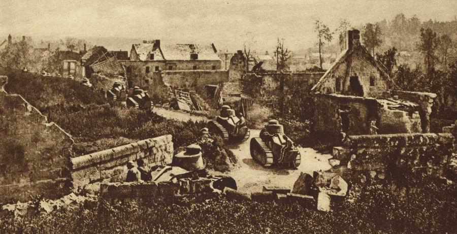 World War 1 French Renault tanks moving through ruined village