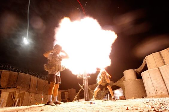 Afghanistan War August 7, 2009, Members of a mortar team attached to the US Army's Dagger Company, 2-12 Infantry, 4th Brigade return fire with a 120mm mortar during an attack by militants on Michigan Base