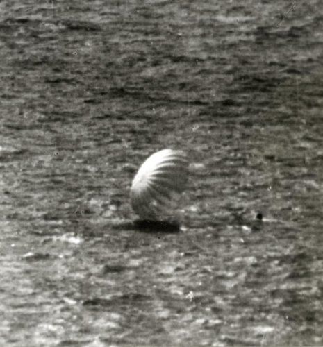 World War 2 German luftwaffe pilot makes emergency landing by parachute into the sea. 1940.