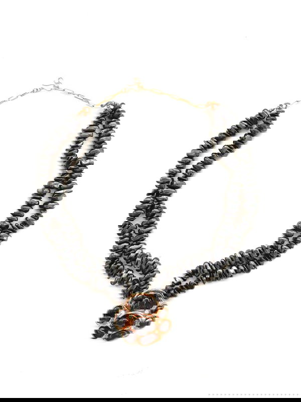 Onyx strands with vintage brooch