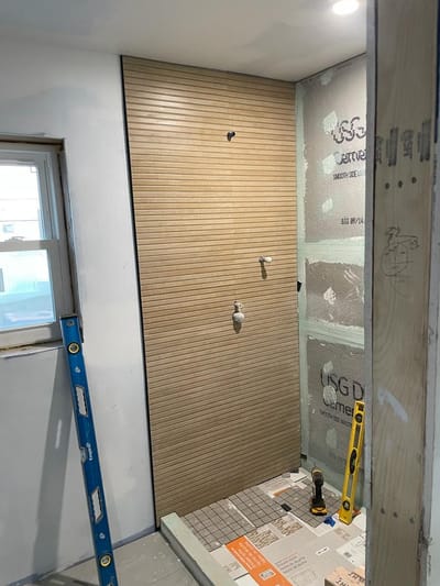 Tiling a new bathroom this week.