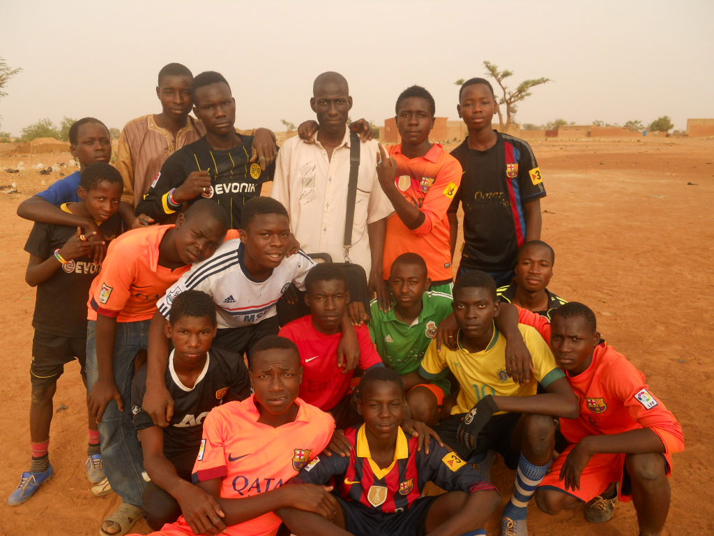 Prince Charles Helping Children with Football